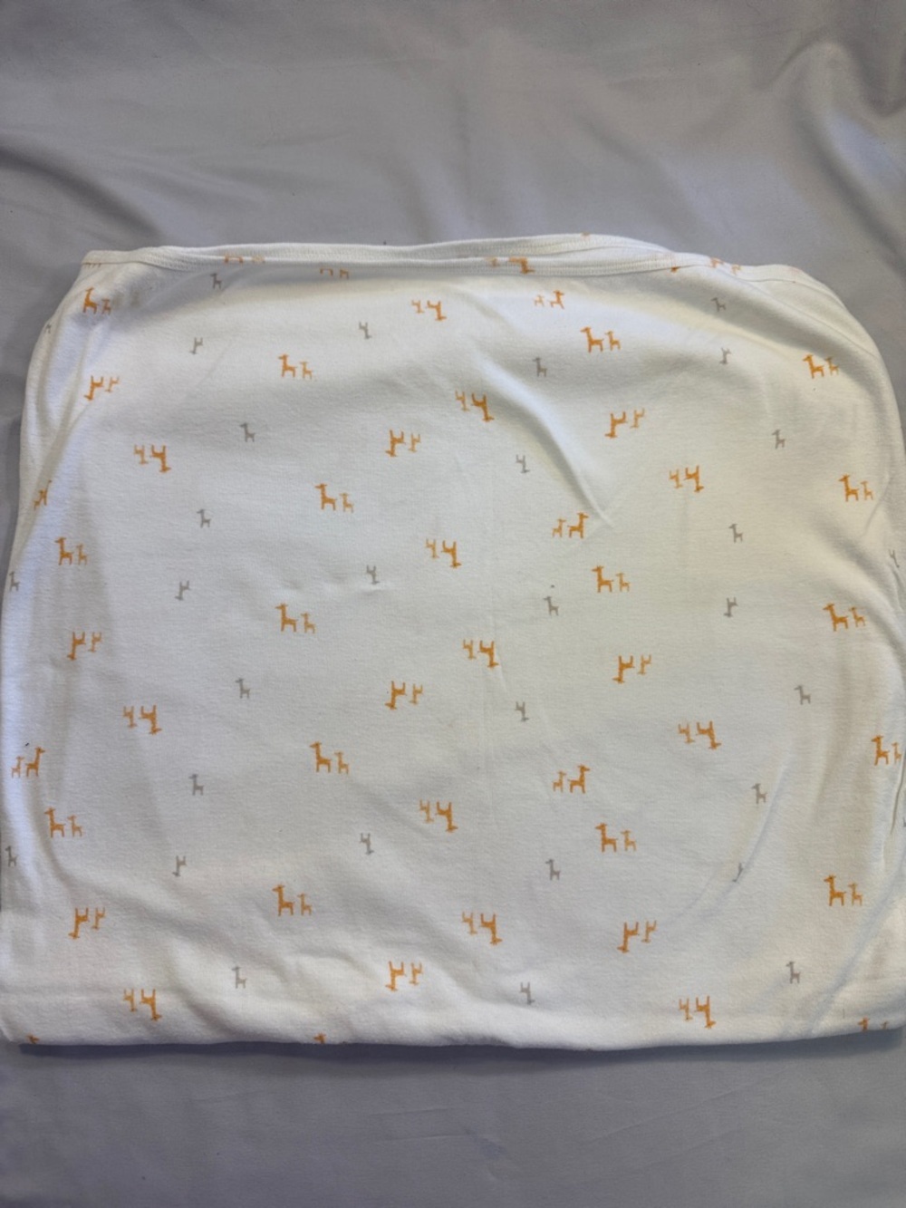 🐥 Carter's White Swaddle with Orange and Gray Giraffe Print
